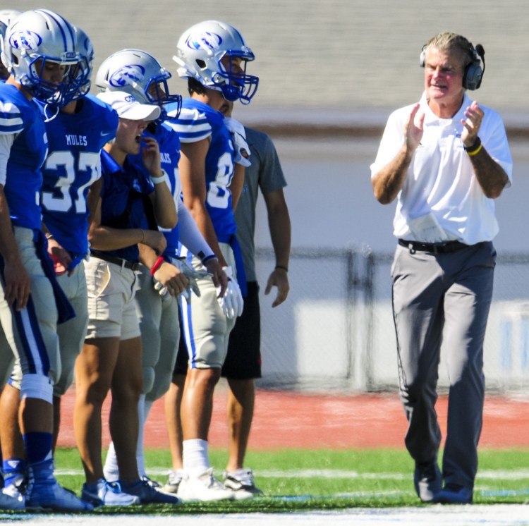 Jack Cosgrove is back on the sideline, exhorting his team. But now it's Colby College, not UMaine, and there's plenty to get done after a 35-0 loss to Trinity in its opener.