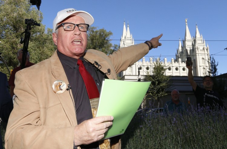 Sam Young speaks in Salt Lake City on Sunday about his excommunication from The Church of Jesus Christ of Latter-day Saints. "The whistleblower has been kicked out," he said. "But ... for our children's sake, this whistleblower is not going to stop roaring."