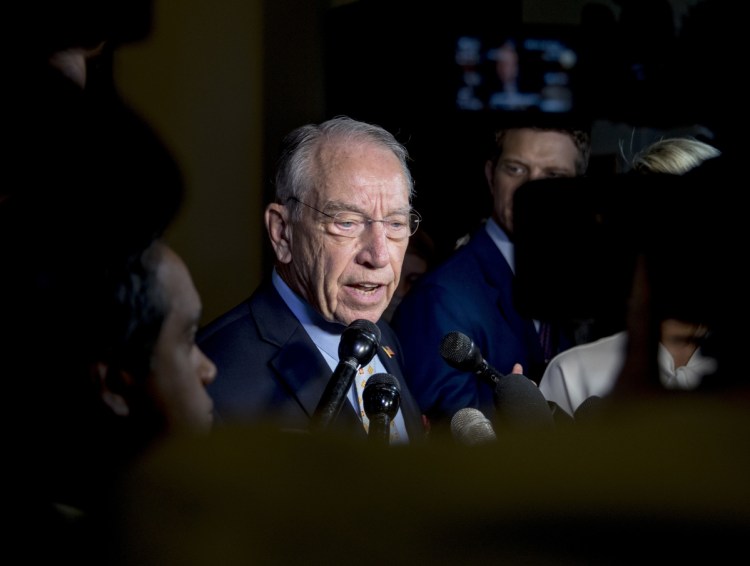 Senate Judiciary Committee Chairman Chuck Grassley, R-Iowa, speaks to reporters on Capitol Hill on Wednesday. On Friday night, he gave Christine Blasey Ford a 10 p.m. deadline to decide whether to testify on her sexual assault allegation against Supreme Court nominee Brett Kavanaugh. Shortly before midnight, he extended that deadline.