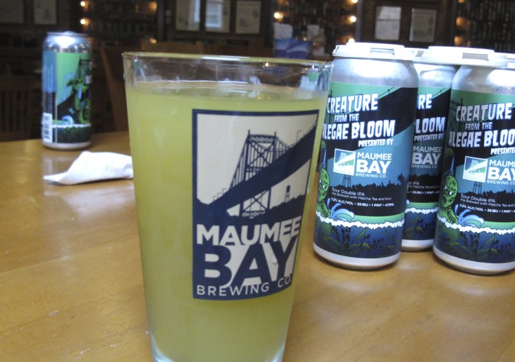 Maumee Bay Brewing makes Alegae Bloom beer to draw attention to the toxic algae on Lake Erie. "We're going to keep doing this until the algae bloom isn't there anymore," brewery manager Craig Kerr said.