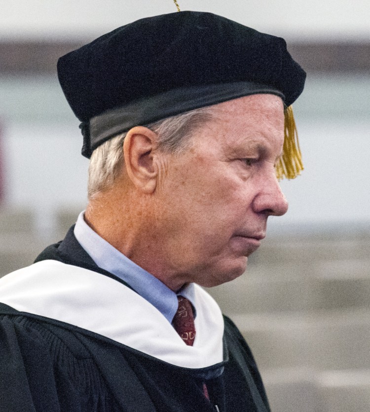 Keynote speaker Ben Bradlee Jr. appears before the annual University of Maine at Augusta convocation Friday at the Augusta Civic Center.