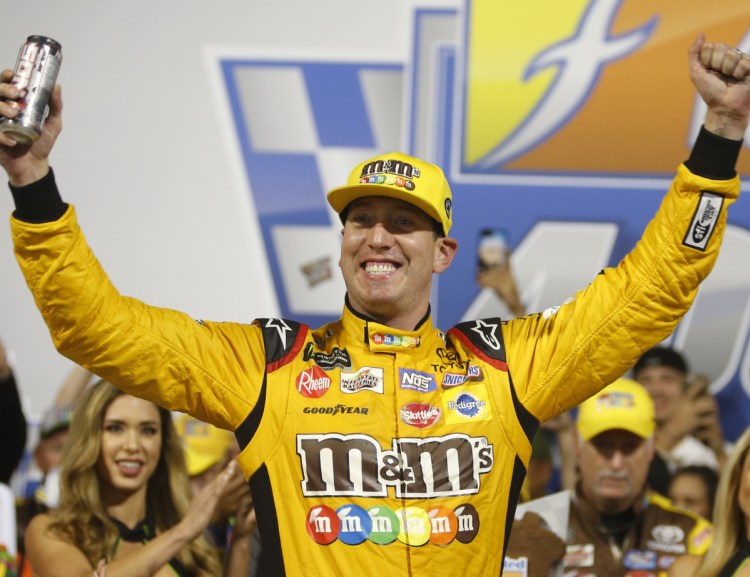 Kyle Busch celebrates Saturday night after he clinched a spot in the second round of the Cup Series playoffs with a victory at Richmond Raceway – the 50th of his career.