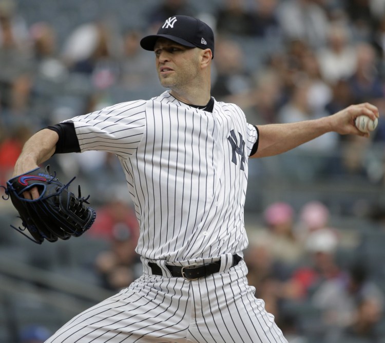 J.A. Happ of the New York Yankees throws in the first inning Sunday. The Yankees lost 6-3 to Baltimore and found out shortstop Didi Gregorius was injured.