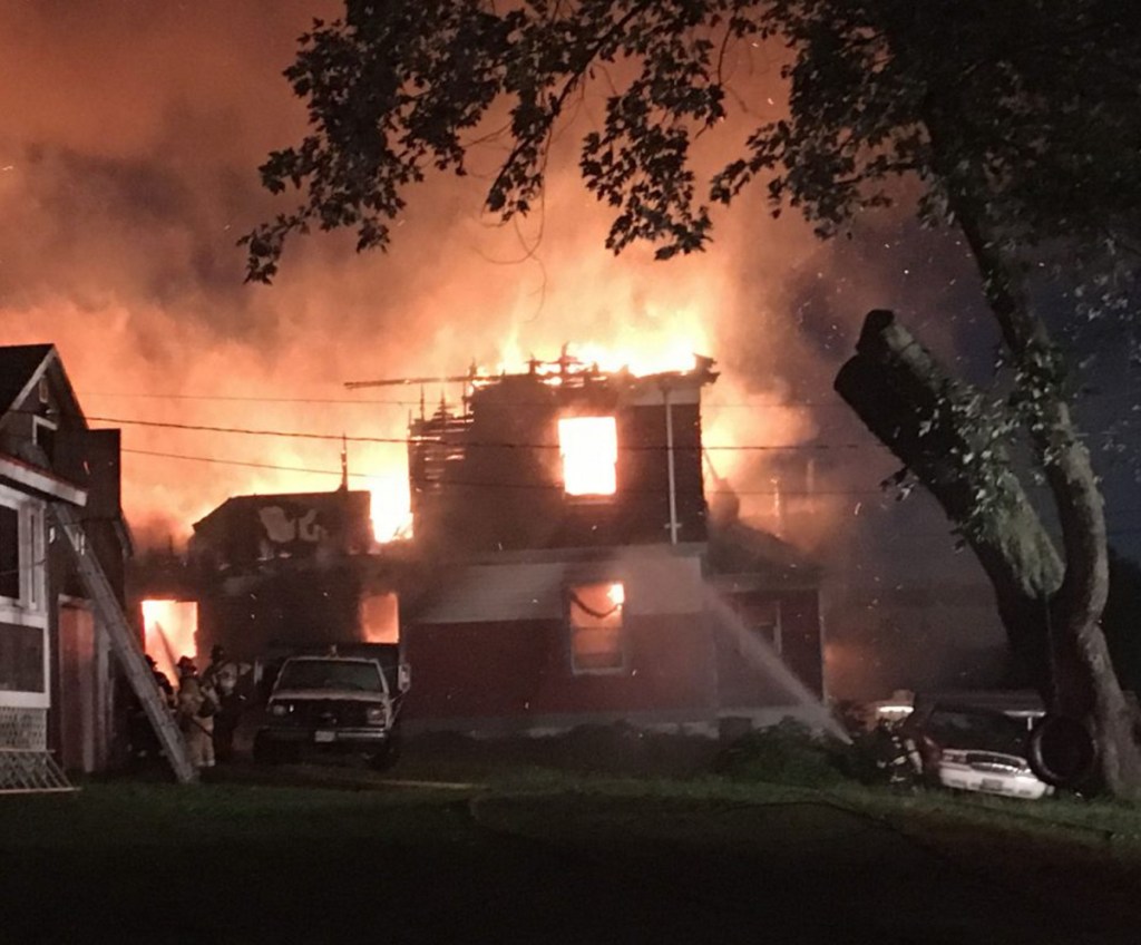 The former Sebenoa Hall was engulfed in flames when the first fire crew arrived on the scene Monday morning. The married couple living in the building escaped the blaze with their dog.