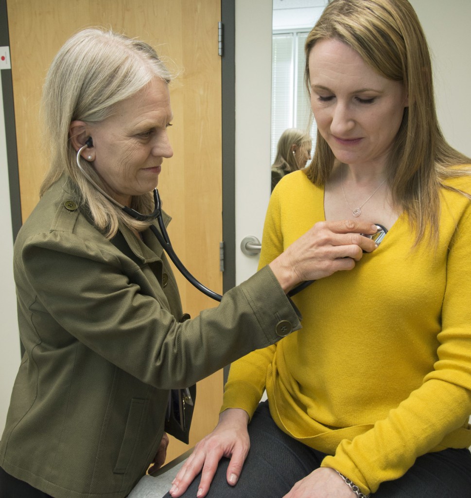 Dr. Linda Vorvick examines Heather VanDusen in Arlington, Wash. VanDusen was given antibiotics to treat her appendicitis and a new study shows it's a reasonable alternative treatment to surgery.