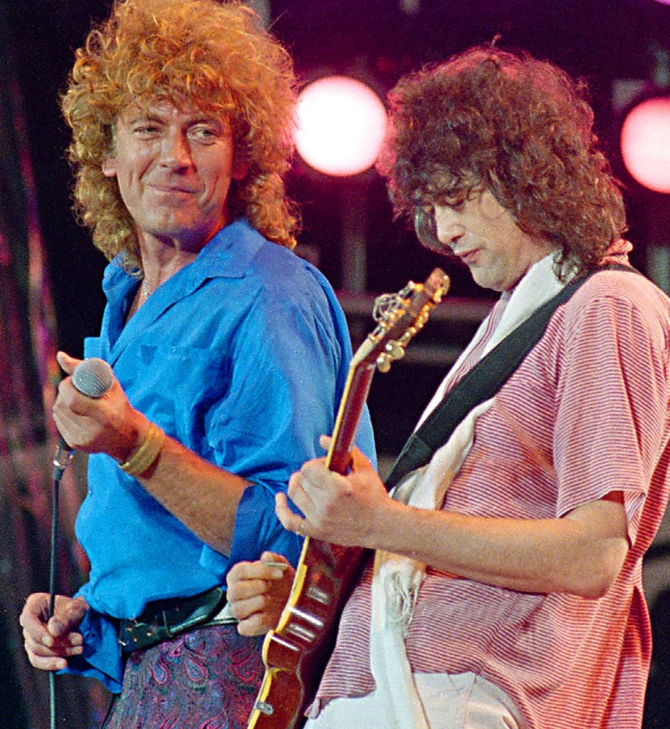 Led Zeppelin's Robert Plant, left, and Jimmy Page reunite to perform in 1985 for the Live Aid famine relief concert at JFK Stadium in Philadelphia. An appeals court ruled Friday that a lower court judge provided erroneous jury instructions two years ago.