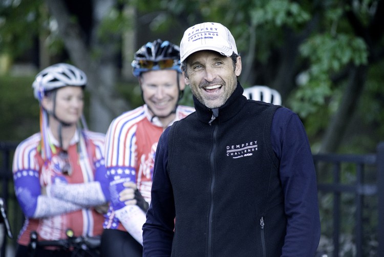 Patrick Dempsey meets cyclists from South Carolina at Bonney Park in Auburn on Friday evening. Fifteen cyclists rode 1,300 miles from Greenville, S.C., to participate in their sixth Dempsey Challenge. Running, walking and biking events take place Saturday and Sunday.