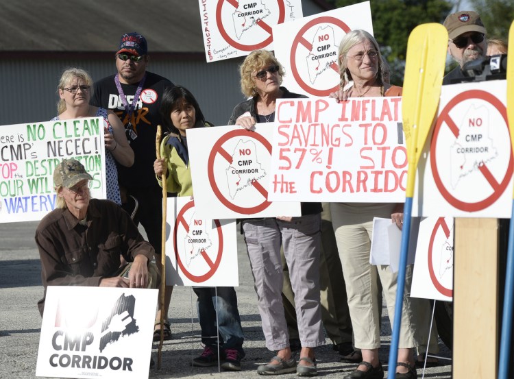 Protesters participate in the Say NO to NECEC rally last September in Augusta. The Franklin County commissioners voted to rescind their approval of the CMP transmission line project at their meeting Tuesday. 