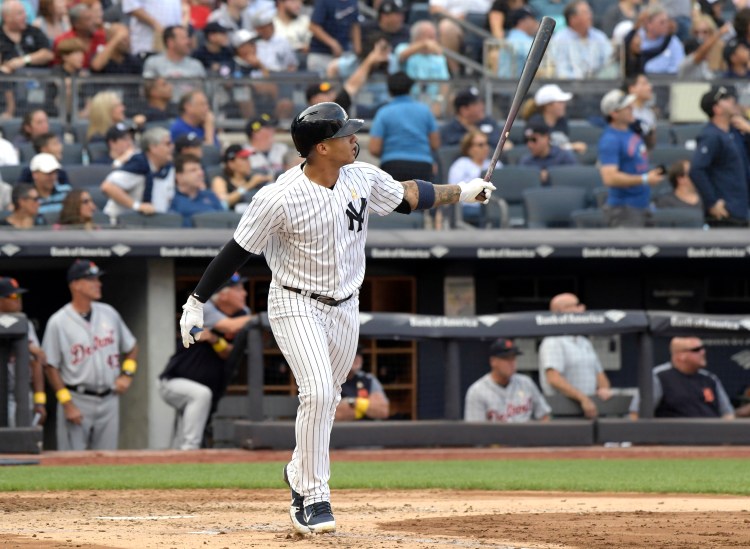 New York's Gleyber Torres follows through on a two-run home run in the fifth inning of the Yankees' 2-1 win over the Tigers on Saturday in New York. 