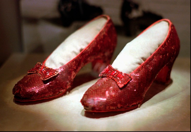 This April 10, 1996, file photo shows one of the four pairs of ruby slippers worn by Judy Garland in the 1939 film "The Wizard of Oz" on display during a media tour of the "America's Smithsonian" traveling exhibition in Kansas City, Mo. Federal authorities say they have recovered a pair of ruby slippers worn by Garland that were stolen from the Judy Garland Museum in Grand Rapids, Minn., in August 2005 when someone went through a window and broke into the small display case. The shoes were insured for $1 million. 