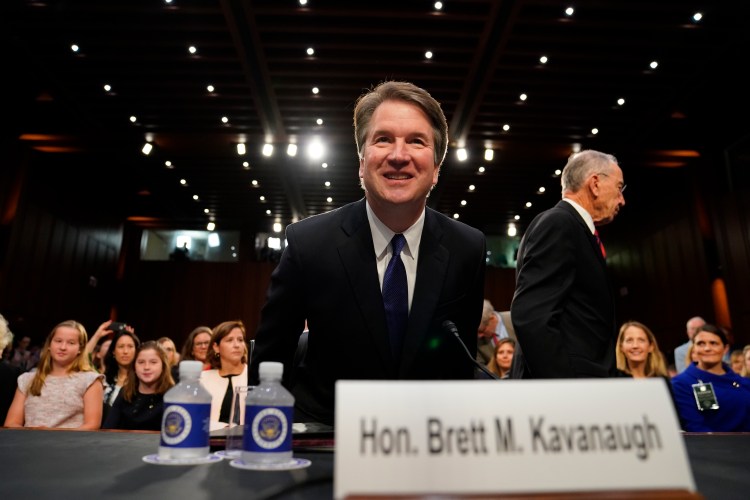 Supreme Court nominee Brett Kavanaugh arrives at the Senate Judiciary Committee on Capitol Hill on Tuesday to begin his confirmation hearing to replace retired Justice Anthony Kennedy. 