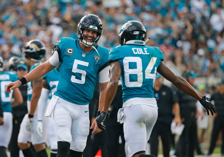 Associated Press/Stephen B. Morton
Jacksonville quarterback Blake Bortles accounted for more than 400 yards against the Patriots, including a TD pass to Keelan Cole. His teammates insist that will soon be routine.
