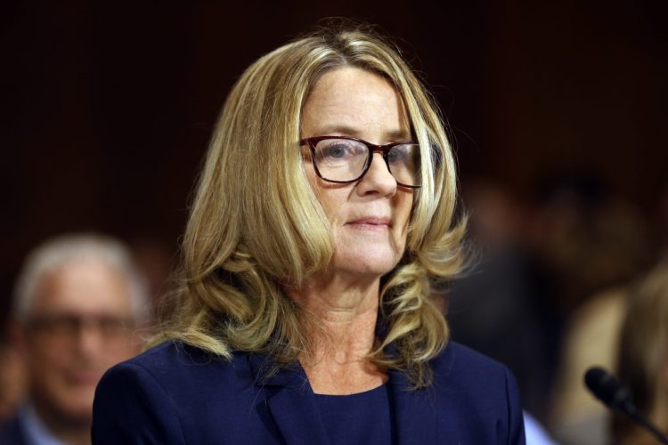 Christine Blasey Ford arrives to testify before the Senate Judiciary Committee on Thursday. 