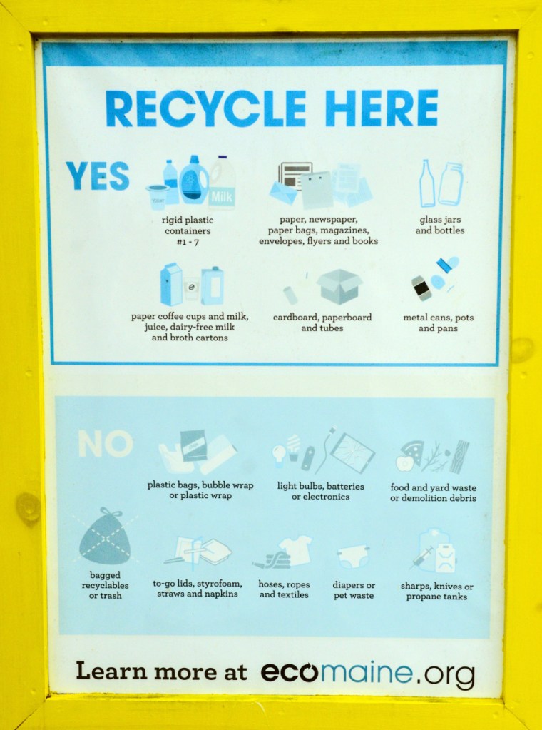 The ecomaine sign explains what to put into the recycle bin on Friday at the Readfield Transfer Station.