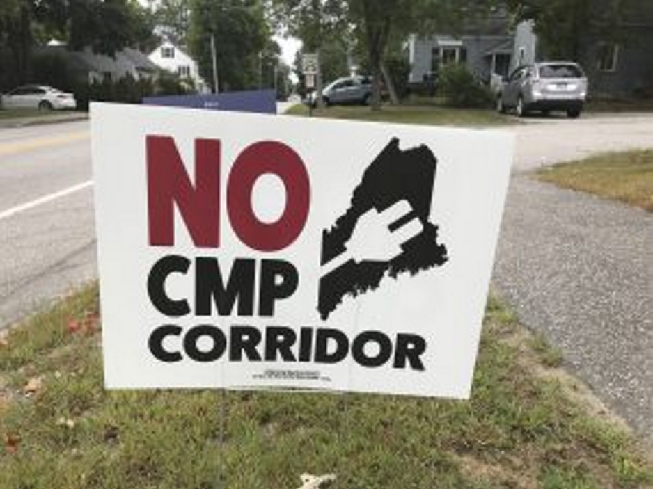 Posters around central Maine express opposition to the proposed 145-mile CMP power line.