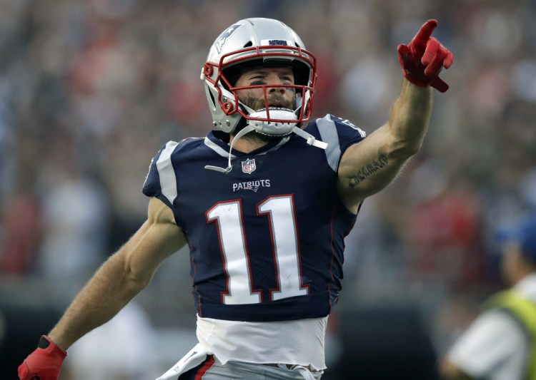 New England Patriots wide receiver Julian Edelman fires up the crowd before a preseason NFL football game against the Philadelphia Eagles, Thursday, Aug. 16, 2018, in Foxborough, Mass. (AP Photo/Charles Krupa)