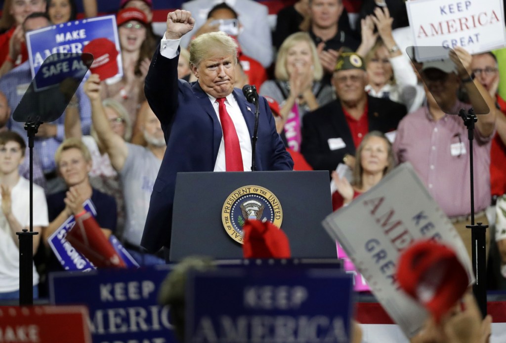 President Donald Trump acknowledges the crowd as he finishes speaking at a rally Monday, Oct. 1, 2018, in Johnson City, Tenn. (AP Photo/Mark Humphrey)