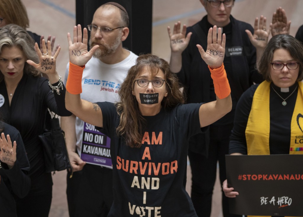 Protesters demonstrate at the Hart Senate Office Building in Washington, D.C., on Thursday, decrying Brett Kavanaugh's Supreme Court nomination.
