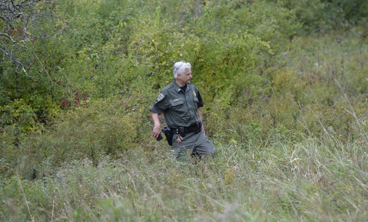 Maine Warden Tim Spahr searches for Kristin Westra of North Yarmouth on Thursday.