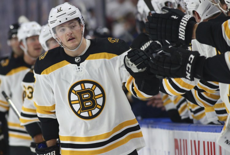 Ryan Donato celebrates his first-period goal Thursday night at Buffalo, N.Y. The Bruins shut out the Sabres, 4-0, as Jaroslav Halak made 32 saves.