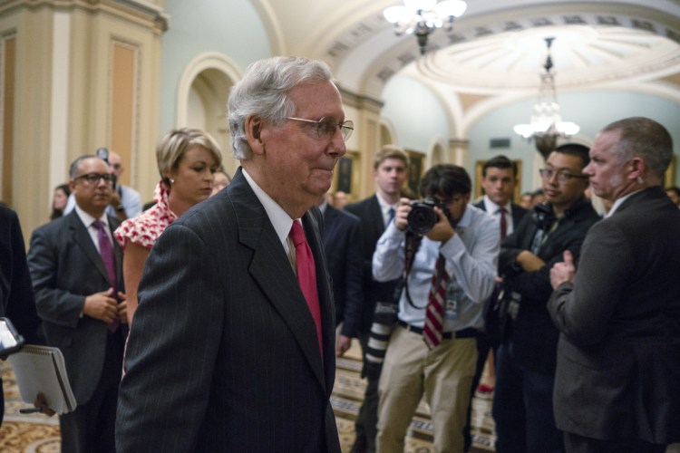 Senate Majority Leader Mitch McConnell, R-Ky.,walks off the Senate floor on Capitol Hill on Friday.