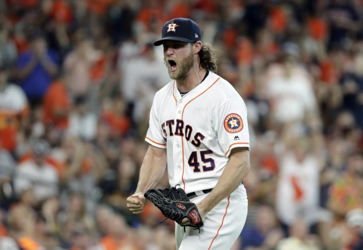 Astros starting pitcher Gerrit Cole reacts after striking out Cleveland's Jose Ramirez to end the sixth inning during Houston's 3-1 win in Game 2 of their American League Division Series on Saturday in Houston. The Astros lead the series 2-0.