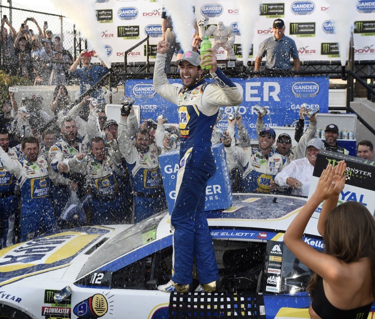 Chase Elliott celebrates after winning the NASCAR Cup series race Sunday at Dover International Speedway – his second career victory.