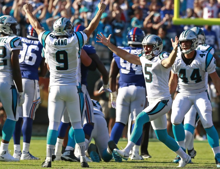 Carolina's Graham Gano celebrates his 63-yard field goal that lifted the Panthers to a 33-31 win Sunday against the New York Giants.