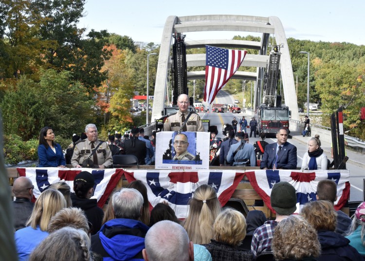 Somerset County Sheriff Dale Lancaster addresses the hundreds people who attended the Corporal Eugene Cole Memorial Bridge dedication ceremony in Norridgewock on Sunday.
