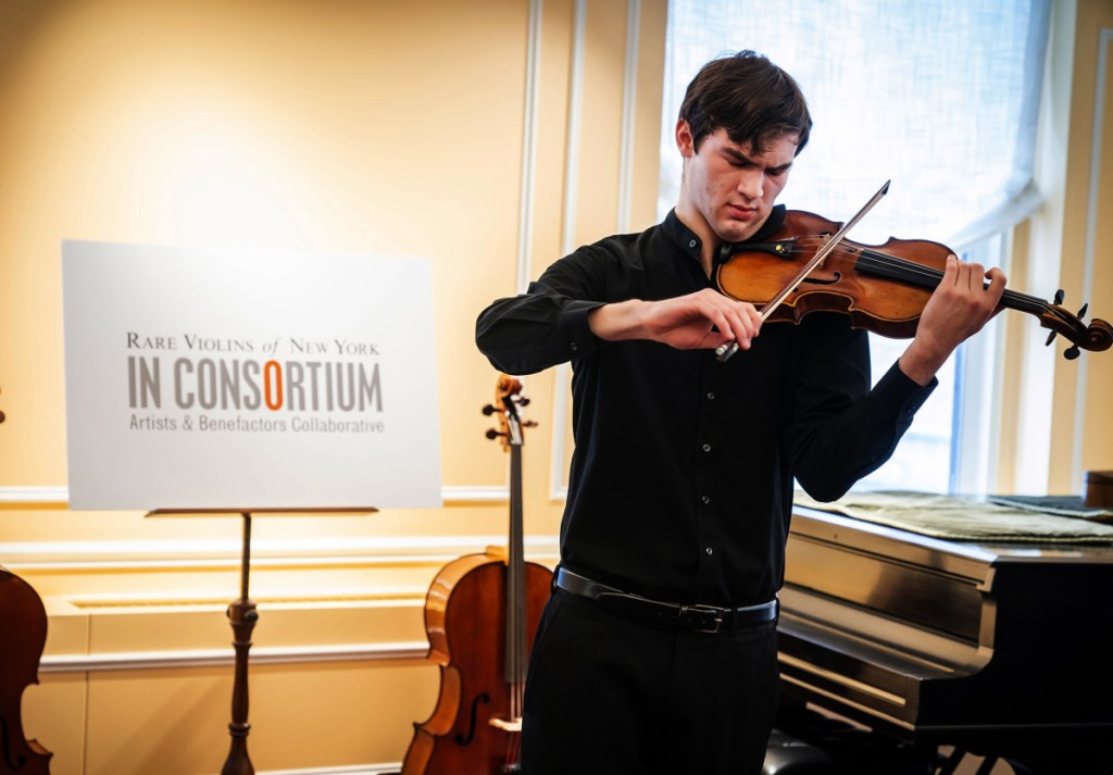 Juilliard student Nathan Meltzer, seen here with the "Ames" Stradivari of 1734. The instrument used to belong to Roman Totenberg before it was stolen.