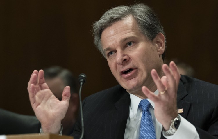 FBI Director Chris Wray testifies at a Senate committee hearing Wednesday on Capitol Hill.