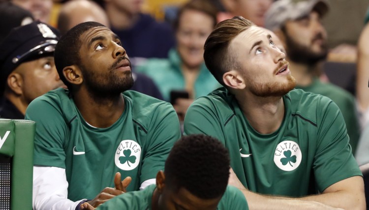 Kyrie Irving, left, and Gordon Hayward were spectators last season as the Boston Celtics made their surprising run to Game 7 of the Eastern Conference finals. Now they're back to join a deep team that doesn't have to deal with LeBron James anymore.