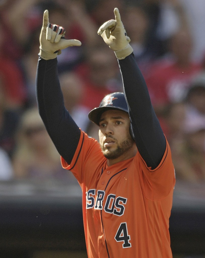 Houston's George Springer reacts after homering against Cleveland during the Astros' series-clinching Game 3 victory in the AL Division Series last Monday.