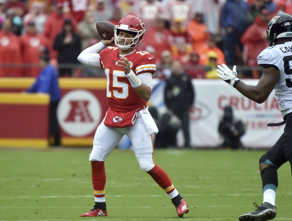 Kansas City Chiefs quarterback Patrick Mahomes (15) throws a pass during the first half of an NFL football game against the Jacksonville Jaguars in Kansas City, Mo., Sunday, Oct. 7, 2018. (AP Photo/Ed Zurga)