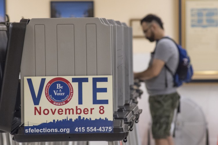 A voter casts a ballot in San Francisco on Nov. 8, 2016.
