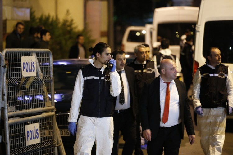 Turkish police officers arrive at the Saudi Arabia's Consulate in Istanbul on Monday. Turkish crime scene investigators dressed in coveralls and gloves entered the consulate Monday, nearly two weeks after the disappearance and alleged slaying of Saudi writer Jamal Khashoggi there.