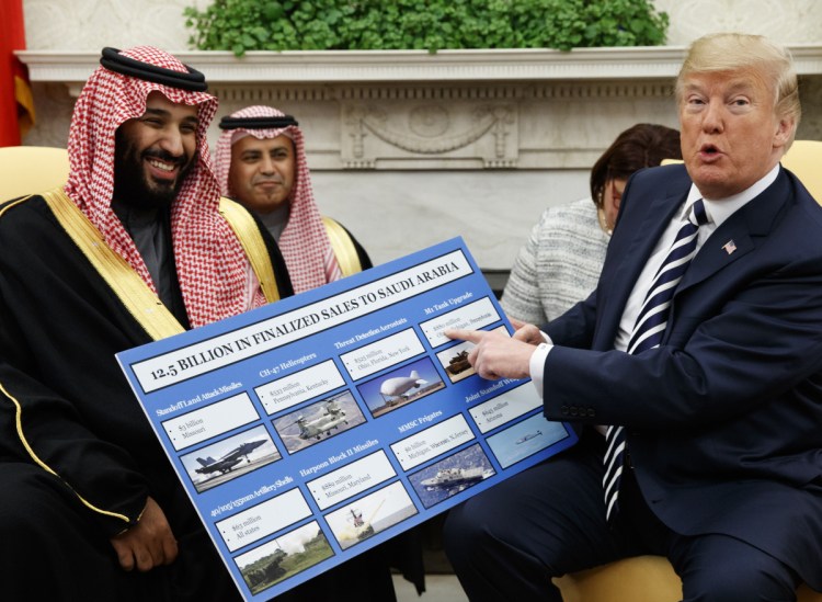 President Trump uses a chart to highlight his arms deal with the Saudi Arabian government during a meeting with Saudi Crown Prince Mohammed bin Salman in the White House Oval Office earlier this year.
