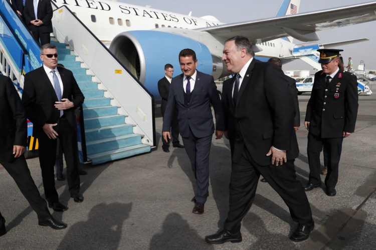U.S. Secretary of State Mike Pompeo, front right, arrives at Ankara, Turkey, on Wednesday as the U.S. delegation arrives for high-level talks over the unexplained disappearance of Saudi writer and journalist Jamal Khashoggi at the Saudi Consulate in Istanbul. On Wednesday, a pro-government Turkish newspaper published a report made from what it described as an audio recording of Khashoggi's torture and slaying.