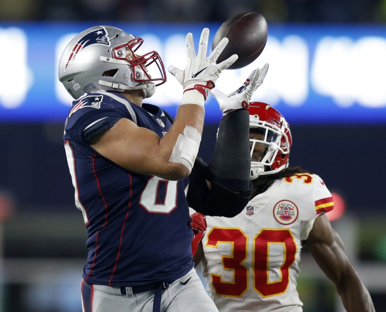 The New England Patriots listed tight end Rob Gronkowski as questionable for Sunday's game at Chicago, not just for a longstanding ankle injury but for the first time with a back problem.