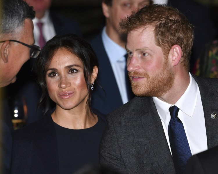 Prince Harry and his wife, Meghan, Duchess of Sussex, meet guests at a reception inside Sydney's iconic Opera House on Saturday.