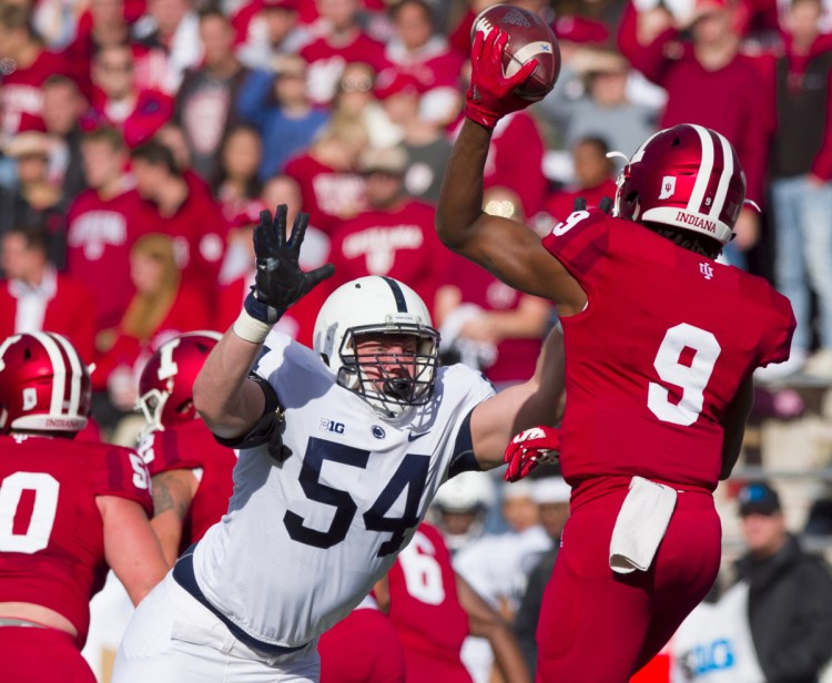 Robert Windsor of Penn State closes in on a sack as Indiana quarterback Michael Penix Jr. searches for a receiver. Penn State won, 33-28.