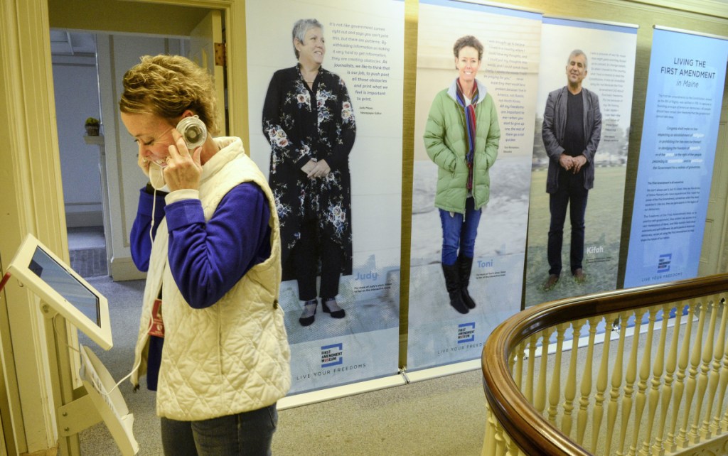 Toni Richardson interacts with an exhibit at the First Amendment Museum in Augusta, expected to fully open to the public by 2020.