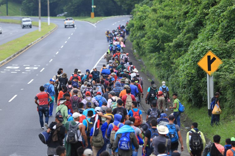 Honduran migrants march in a caravan toward Mexico on Oct. 18. What is the United States' responsibility in the developing world? a letter writer asks.