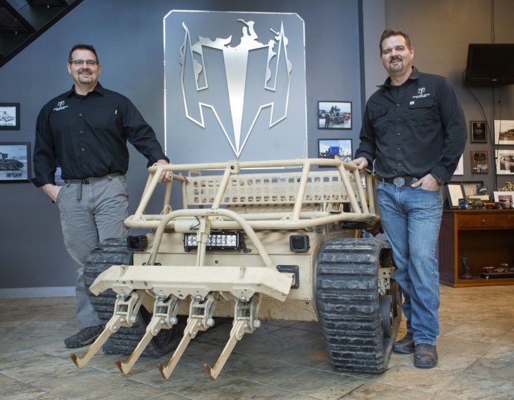 Seen in 2017, Howe and Howe Technologies President Michael Howe, left, and his twin, Geoff, the Waterboro company's CEO, will retain their roles after the planned sale to Textron this year.