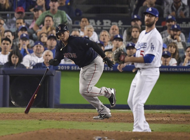 Rafael Devers laces a run-scoring single off reliever Dylan Floro of the Los Angeles Dodgers, driving in the tiebreaking run in the ninth inning Saturday and sparking the Boston Red Sox to a 9-6 victory and a 3-1 lead in the World Series.