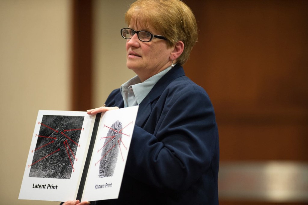 The murder of Vanessa Pham in Fairfax County, Va., was unsolved until the suspect was arrested years later for shoplifting and his fingerprint entered into the state system. Here, fingerprint expert Jean Escobedo explains the matched prints to a jury. 
