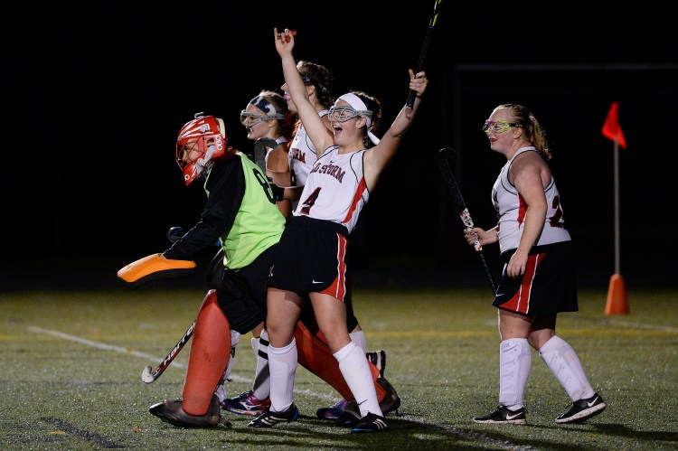 Scarborough’s Tegan Tanner celebrates Wednesday night after her team’s 2-0 win over Cheverus in a Class A South field hockey quarerfinal. The third-seeded Red Storm will face No. 2 Westbrook on Saturday.