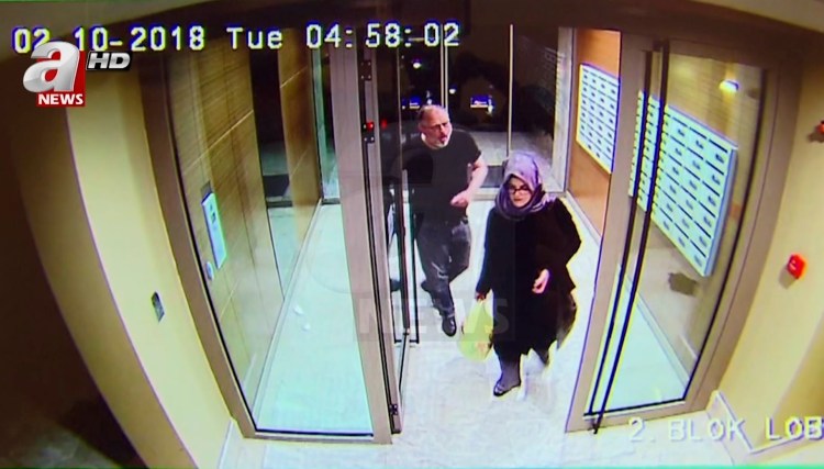 This image taken from CCTV video that emerged Monday purportedly shows Saudi writer Jamal Khashoggi and his fiancee, Hatice Cengiz, at an apartment building in Istanbul, Turkey, hours before his death in the Saudi Arabian consulate.  The video was broadcast by the pro-Turkish government television channel A News, and was said to be obtained via Turkey's security sources.