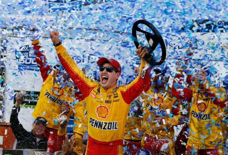 Joey Logano celebrates winning the NASCAR Cup Series race at Martinsville Speedway on Sunday in Martinsville, Va.