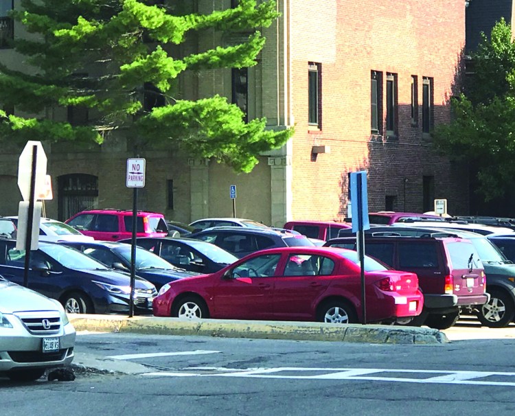 A complaint has been filed against the city of Biddeford to stop a parking  plan that would charge for parking in the downtown in city-owned parking lots.